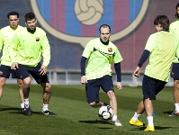 Xavi, Piqu, Iniesta i Bojan, en un instant de l'entrenament d'aquest divendres. Fotos: lex Caparrs - FCB.