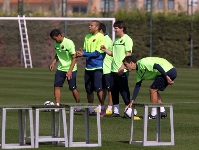 Jeffren, Alves, Messi i Busquets, en un instant de l'entrenament. Foto: Miguel Ruiz.