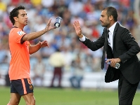 Xavi y Guardiola, premiados con la medalla de oro al Mérito Deportivo. Fotos: arxiu FCB.