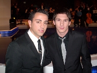 Foto: Xavi y Messi, durante la gala del FIFA World Player del ao pasado.