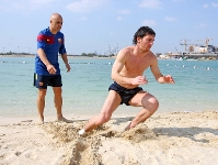 Messi trains on beach