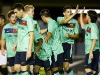 Els jugadors del filial celebrant el gol blaugrana. Fotos: Àlex Caparrós-FCB.