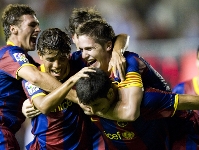 Los jugadores del Barça B celebran el gol del triunfo ante el Xerez. Fotos: Àlex Caparrós-FCB.