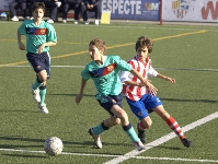Un instant del partit entre el Vilassar de Mar A i l'Infantil B del Bara. Fotos: arxiu FCB/Severino Fernndez Sainz.