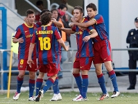 Els jugadors del Barça B celebrant el gol de Rochina (0-1). Fotos: ampress.