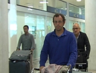 El president Sandro Rosell a la seva arribada a l'aeroport del Prat.