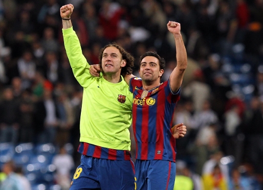 Milito i Xavi, desprs del 0-2 de l'any passat. Foto: Miguel Ruiz (FCB).