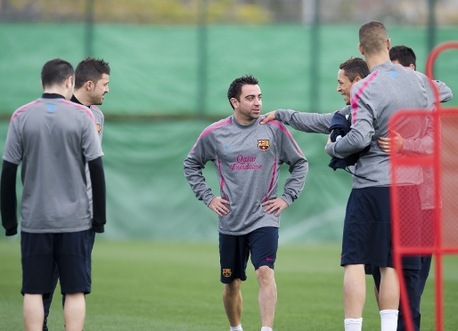 Xavi and Jeffren train with the group