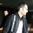 Josep Guardiola sortint de l'aeroport de Li. Al darrera l'ajudant del tcnic, Tito Vilanova.