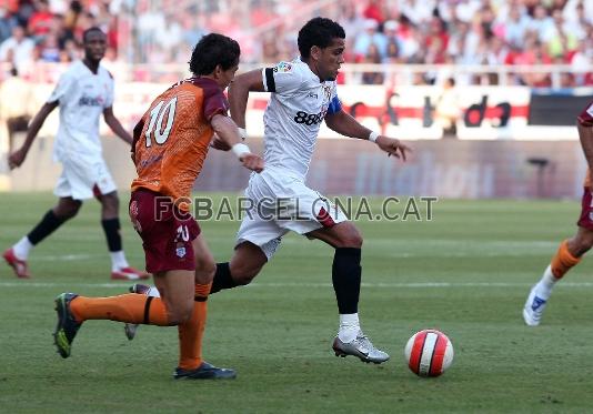 Alves, con el Sevilla.