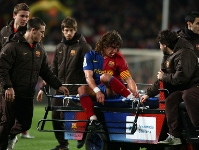Puyol out for three weeks