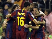 Puyol and Busquets assure victory
