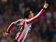 Afellay to arrive on December 23