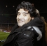 Maradona, sentado en el Palco del Camp Nou.