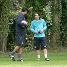 Rijkaard y Messi, hablando.
