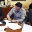 El vicepresident Rafael Yuste, el president Joan Laporta, Xavi i el seu representant, Ivan Corretja, en el moment de la signatura.